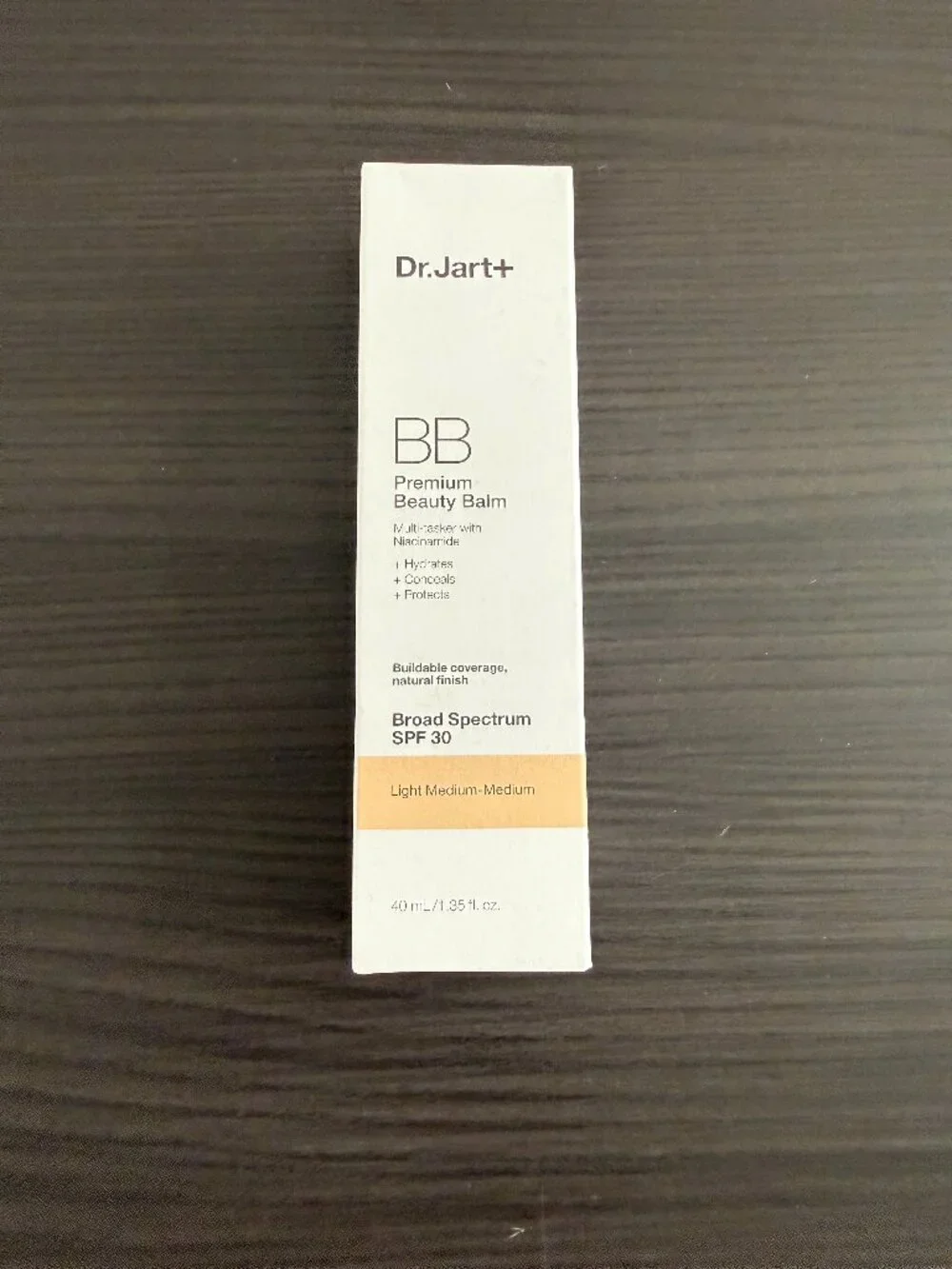 Dr. Jart+ Premium Beauty Balm product box in a light-to-med